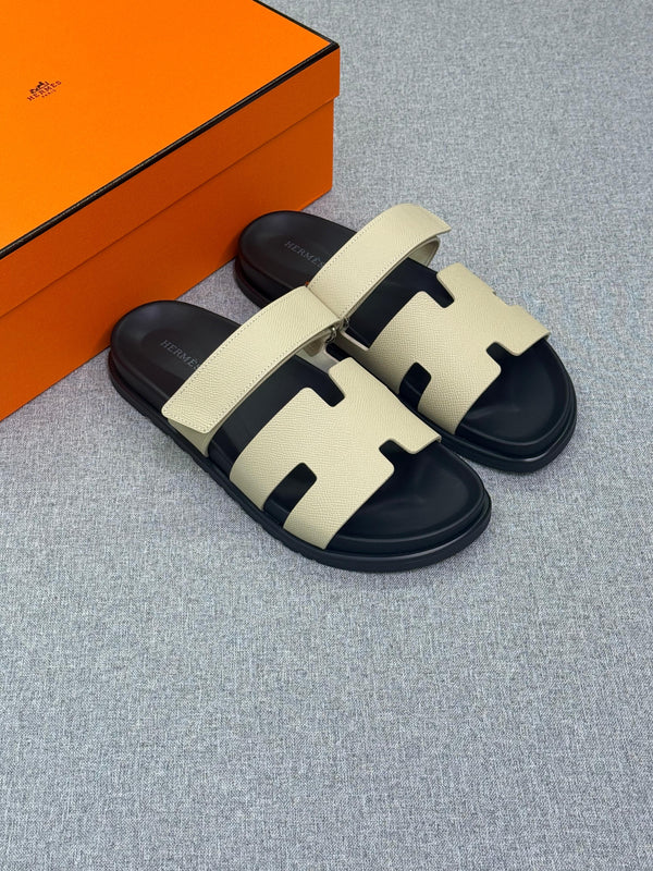 Hermès Chypre sandal, a men's techno-sandal anatomical rubber sole and an adjustable strap.