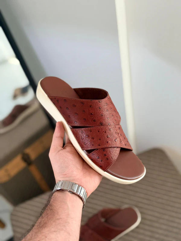 Loro Piana Palm Walk Sandals crafted from ostrich leather.