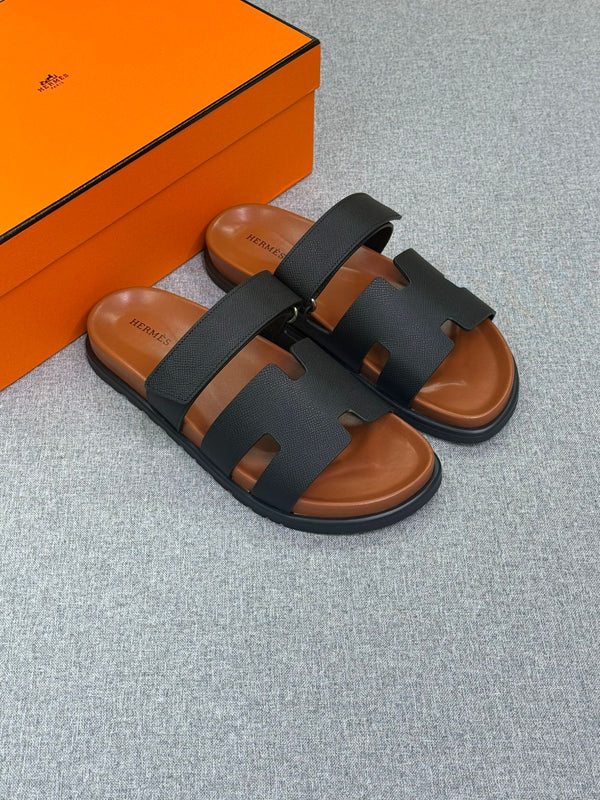 Hermès Chypre sandal black calfskin straps rubber sole