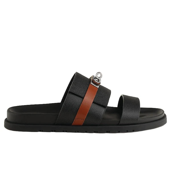 Hermès Jackson Sandals in black leather with a palladium-plated Kelly buckle.